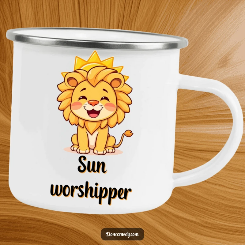 Funny camping mug featuring a happy lion balancing a yellow sun on its nose, ideal for outdoor fun.