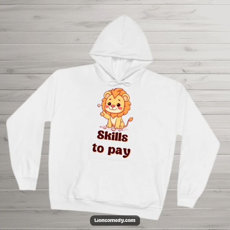 Funny kawaii lion cub with a curious head tilt, juggling shiny pebbles, featured on a warm and cozy hoodie.