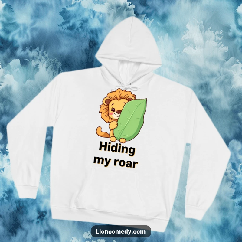 Funny Kawaii lion hoodie with a cute lion hiding behind a leafy cover, peeking out. Warm and humorous.