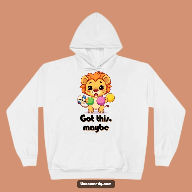 Stay warm and inspired with this funny hoodie featuring a focused kawaii lion mastering its juggling act. Perfect for cozy concentration.