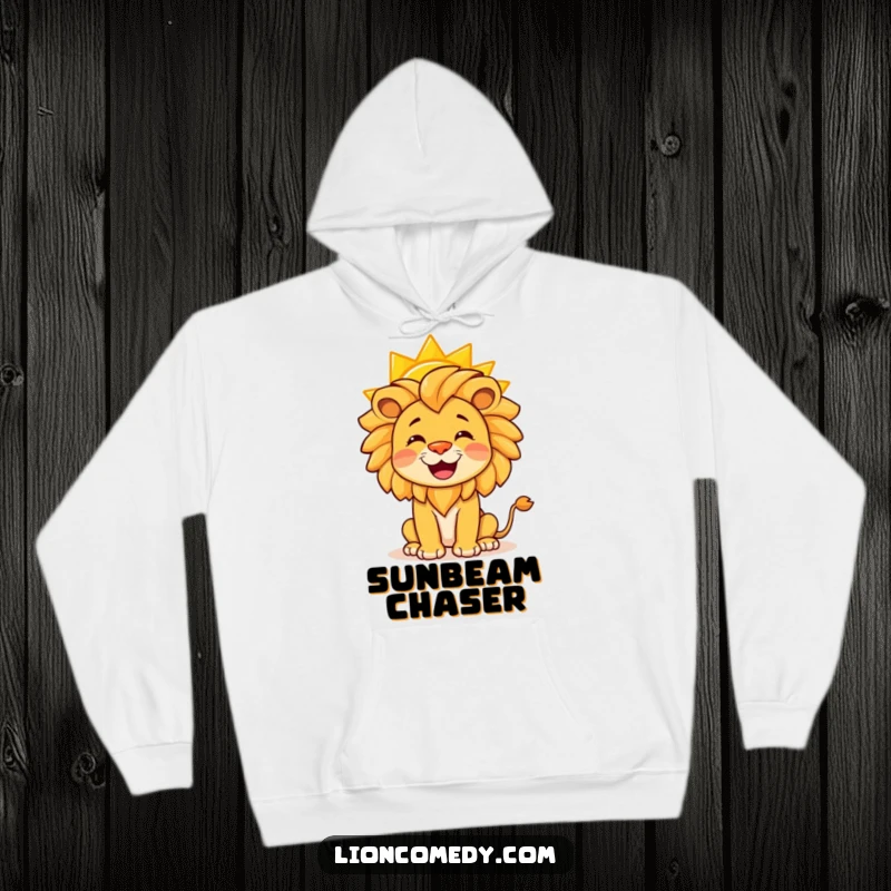 Funny hoodie with a delightful lion balancing a glowing yellow sun on its nose, exuding happiness and warmth.