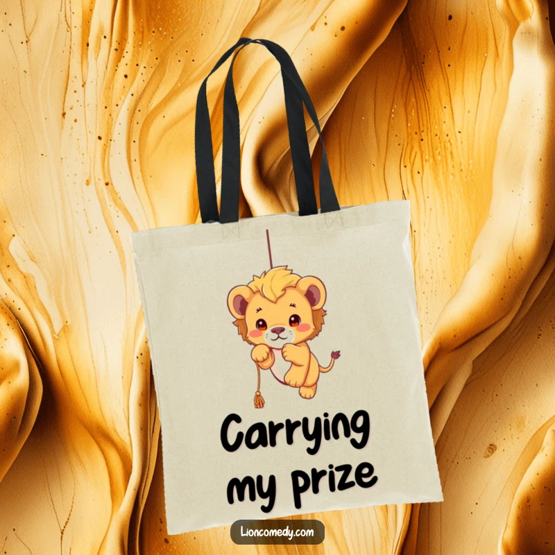 Funny kawaii lion cub tote bag featuring a cute cub mid-leap, playfully attacking a dangling string, perfect for carrying essentials with flair.