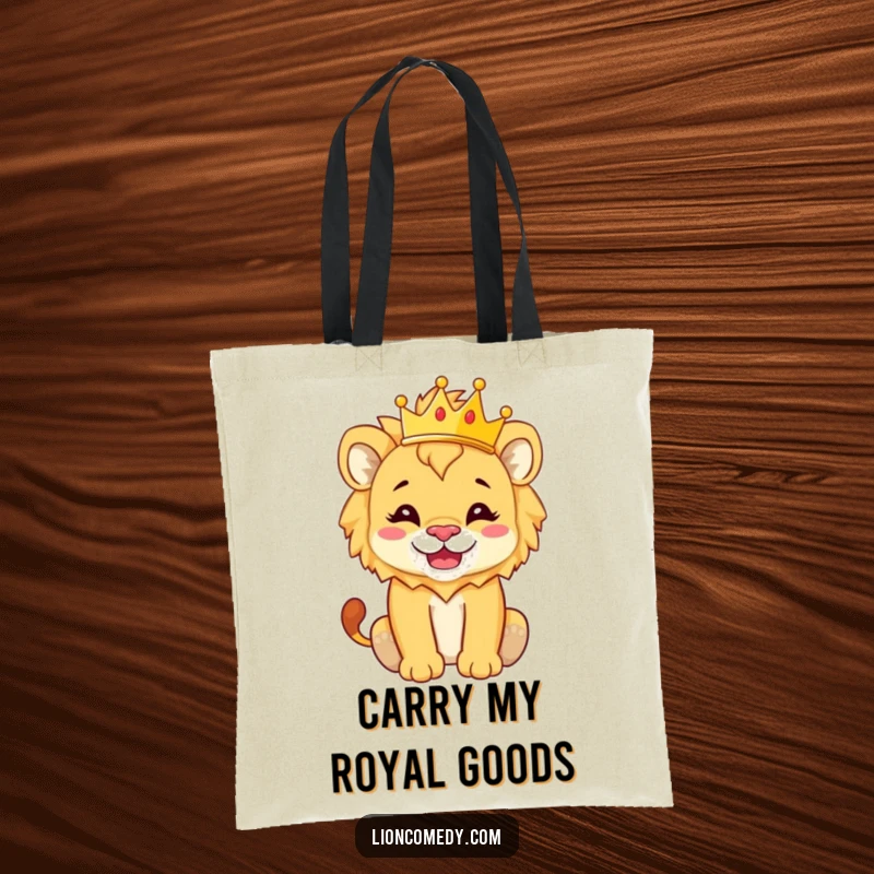 Funny Tote Bag featuring a lion cub with a silly grin and a tiny crown, looking like a tiny ruler.